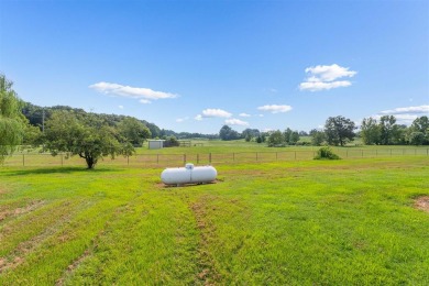 This stunning 3-bedroom, 2-bathroom double-wide home sits on a 2 on Panther Creek Golf Course in Kentucky - for sale on GolfHomes.com, golf home, golf lot