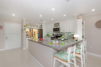 STUNNING COMPLETELY REMODELED TOWNHOUSE IN DESIRABLE AREA OF on Costa Greens Golf Club in Florida - for sale on GolfHomes.com, golf home, golf lot