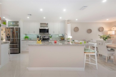 STUNNING COMPLETELY REMODELED TOWNHOUSE IN DESIRABLE AREA OF on Costa Greens Golf Club in Florida - for sale on GolfHomes.com, golf home, golf lot