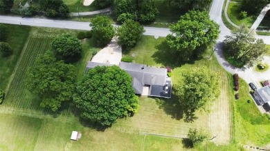 Sprawling 3 bed 3 bath brick ranch with golf course views! on Uniontown Country Club in Pennsylvania - for sale on GolfHomes.com, golf home, golf lot