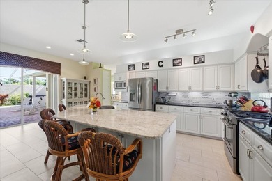 Beautifully updated 1994 Palmwood Bahama Breeze courtyard pool on Glen Lakes Country Club in Florida - for sale on GolfHomes.com, golf home, golf lot