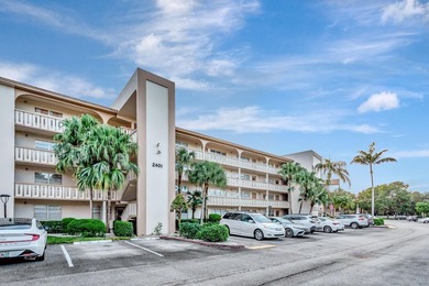 Bright first floor condo in Wynmoor, a gated 55 plus community on Wynmoor Golf Course in Florida - for sale on GolfHomes.com, golf home, golf lot