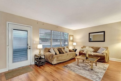 Bright first floor condo in Wynmoor, a gated 55 plus community on Wynmoor Golf Course in Florida - for sale on GolfHomes.com, golf home, golf lot