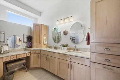 Beautifully updated 1994 Palmwood Bahama Breeze courtyard pool on Glen Lakes Country Club in Florida - for sale on GolfHomes.com, golf home, golf lot