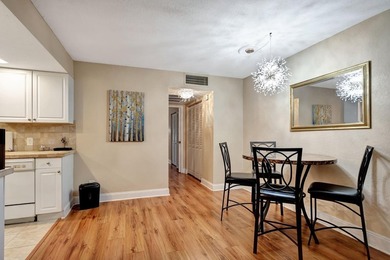 Bright first floor condo in Wynmoor, a gated 55 plus community on Wynmoor Golf Course in Florida - for sale on GolfHomes.com, golf home, golf lot