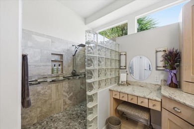 Beautifully updated 1994 Palmwood Bahama Breeze courtyard pool on Glen Lakes Country Club in Florida - for sale on GolfHomes.com, golf home, golf lot