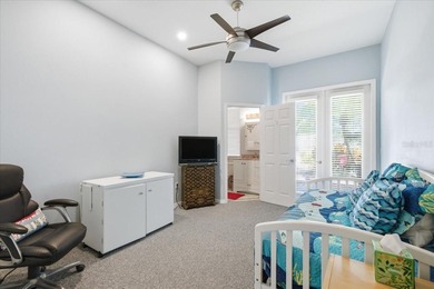 Beautifully updated 1994 Palmwood Bahama Breeze courtyard pool on Glen Lakes Country Club in Florida - for sale on GolfHomes.com, golf home, golf lot