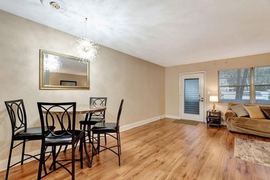 Bright first floor condo in Wynmoor, a gated 55 plus community on Wynmoor Golf Course in Florida - for sale on GolfHomes.com, golf home, golf lot