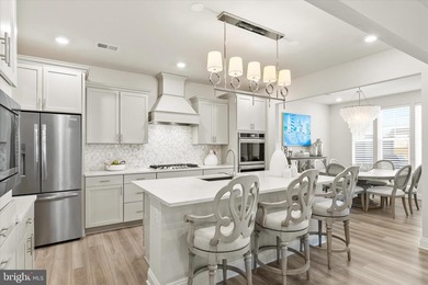 Welcome to 24321 Blue Crab Ave, a three-year-young town home on The Peninsula Golf and Country Club in Delaware - for sale on GolfHomes.com, golf home, golf lot