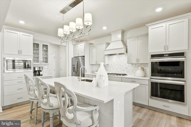 Welcome to 24321 Blue Crab Ave, a three-year-young town home on The Peninsula Golf and Country Club in Delaware - for sale on GolfHomes.com, golf home, golf lot