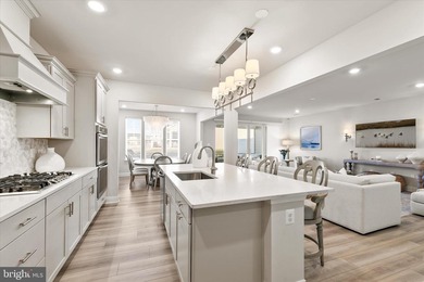 Welcome to 24321 Blue Crab Ave, a three-year-young town home on The Peninsula Golf and Country Club in Delaware - for sale on GolfHomes.com, golf home, golf lot