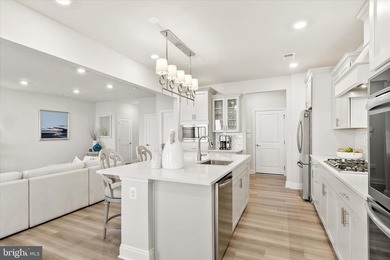 Welcome to 24321 Blue Crab Ave, a three-year-young town home on The Peninsula Golf and Country Club in Delaware - for sale on GolfHomes.com, golf home, golf lot