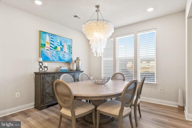 Welcome to 24321 Blue Crab Ave, a three-year-young town home on The Peninsula Golf and Country Club in Delaware - for sale on GolfHomes.com, golf home, golf lot