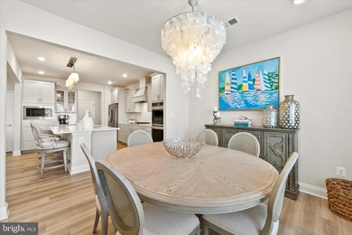 Welcome to 24321 Blue Crab Ave, a three-year-young town home on The Peninsula Golf and Country Club in Delaware - for sale on GolfHomes.com, golf home, golf lot