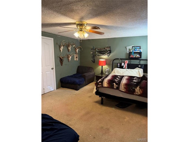 Welcome to Raintree Village Condominiums!  This 2-bedroom, 1 on Raintree Country Club in Missouri - for sale on GolfHomes.com, golf home, golf lot