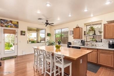 Live in an oasis at Johnson Ranch! This elegant 4-bedroom, 2 on The Golf Club At Johnson Ranch in Arizona - for sale on GolfHomes.com, golf home, golf lot