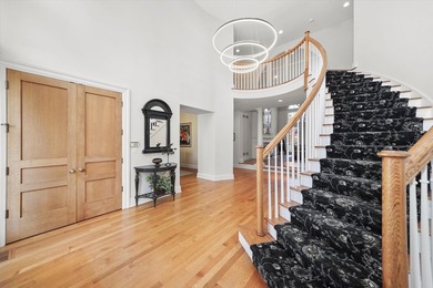 Tucked behind the gates of The Club at Wynstone, this estate on Wynstone Golf Club in Illinois - for sale on GolfHomes.com, golf home, golf lot