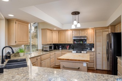 Beautifully updated 3 BR, 3 bath home overlooking the 11th hole on SunLand Golf and Country Club in Washington - for sale on GolfHomes.com, golf home, golf lot