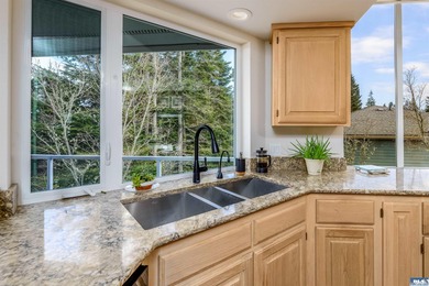 Beautifully updated 3 BR, 3 bath home overlooking the 11th hole on SunLand Golf and Country Club in Washington - for sale on GolfHomes.com, golf home, golf lot