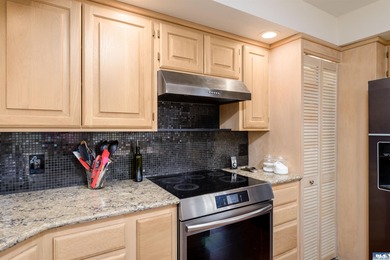 Beautifully updated 3 BR, 3 bath home overlooking the 11th hole on SunLand Golf and Country Club in Washington - for sale on GolfHomes.com, golf home, golf lot