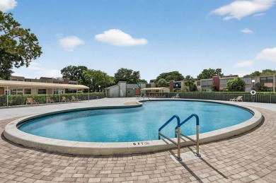 Spacious 2-bedroom, 2-bath condo located in a quiet 55+ on Oriole Golf and Tennis Club in Florida - for sale on GolfHomes.com, golf home, golf lot
