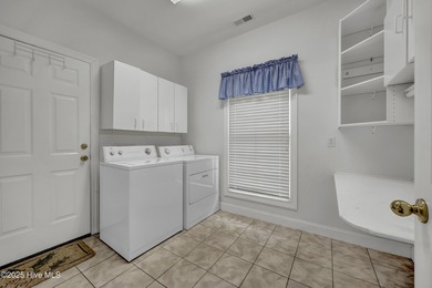 FRESH NEW LOOK!!! Interior repainted, new carpet downstairs, and on Carolina National Golf Club in North Carolina - for sale on GolfHomes.com, golf home, golf lot