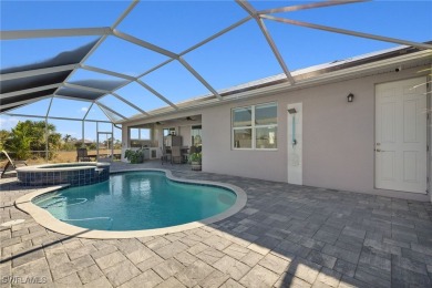 OWNER RELOCATED - ALL OFFERS CONSIDERED! This Gulf access pool on Burnt Store Golf Club in Florida - for sale on GolfHomes.com, golf home, golf lot