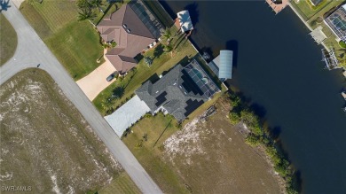OWNER RELOCATED - ALL OFFERS CONSIDERED! This Gulf access pool on Burnt Store Golf Club in Florida - for sale on GolfHomes.com, golf home, golf lot