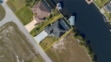 OWNER RELOCATED - ALL OFFERS CONSIDERED! This Gulf access pool on Burnt Store Golf Club in Florida - for sale on GolfHomes.com, golf home, golf lot