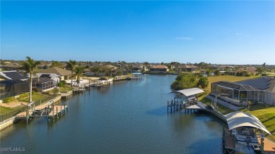 OWNER RELOCATED - ALL OFFERS CONSIDERED! This Gulf access pool on Burnt Store Golf Club in Florida - for sale on GolfHomes.com, golf home, golf lot