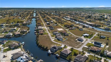 OWNER RELOCATED - ALL OFFERS CONSIDERED! This Gulf access pool on Burnt Store Golf Club in Florida - for sale on GolfHomes.com, golf home, golf lot