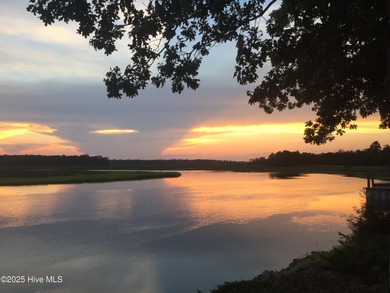 FRESH NEW LOOK!!! Interior repainted, new carpet downstairs, and on Carolina National Golf Club in North Carolina - for sale on GolfHomes.com, golf home, golf lot