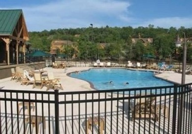 This beautiful acre golf course lot in Stonebridge Village gives on Ledgestone Country Club and Golf Course in Missouri - for sale on GolfHomes.com, golf home, golf lot