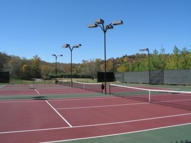 This beautiful acre golf course lot in Stonebridge Village gives on Ledgestone Country Club and Golf Course in Missouri - for sale on GolfHomes.com, golf home, golf lot