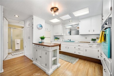 (Carport 4, Spot 31)Adorable seaside cottage vibes on this on Leisure World Seal Beach Golf Course in California - for sale on GolfHomes.com, golf home, golf lot