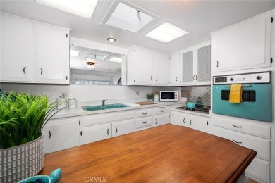 (Carport 4, Spot 31)Adorable seaside cottage vibes on this on Leisure World Seal Beach Golf Course in California - for sale on GolfHomes.com, golf home, golf lot