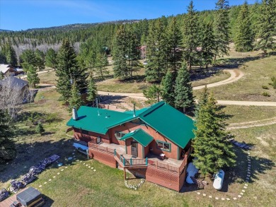 Welcome to The Great Escape, a desirable 3BR/2BA alpine home on El Valle Escondido Golf Course in New Mexico - for sale on GolfHomes.com, golf home, golf lot