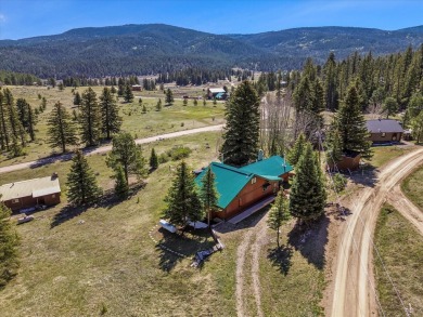 Welcome to The Great Escape, a desirable 3BR/2BA alpine home on El Valle Escondido Golf Course in New Mexico - for sale on GolfHomes.com, golf home, golf lot