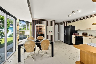 Discover an exquisite residence in the prestigious, golf on Plantation Bay Golf and Country Club in Florida - for sale on GolfHomes.com, golf home, golf lot