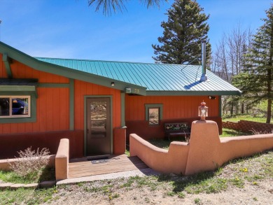 Welcome to The Great Escape, a desirable 3BR/2BA alpine home on El Valle Escondido Golf Course in New Mexico - for sale on GolfHomes.com, golf home, golf lot