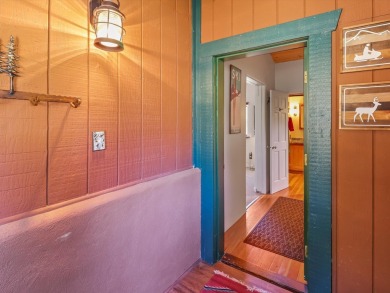 Welcome to The Great Escape, a desirable 3BR/2BA alpine home on El Valle Escondido Golf Course in New Mexico - for sale on GolfHomes.com, golf home, golf lot
