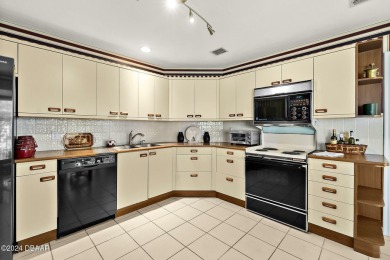 Discover an exquisite residence in the prestigious, golf on Plantation Bay Golf and Country Club in Florida - for sale on GolfHomes.com, golf home, golf lot