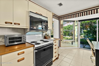 Discover an exquisite residence in the prestigious, golf on Plantation Bay Golf and Country Club in Florida - for sale on GolfHomes.com, golf home, golf lot
