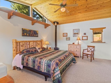Welcome to The Great Escape, a desirable 3BR/2BA alpine home on El Valle Escondido Golf Course in New Mexico - for sale on GolfHomes.com, golf home, golf lot