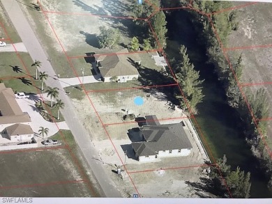 This double lot is perfect if you love living on the water in a on Del Tura Golf and Country Club in Florida - for sale on GolfHomes.com, golf home, golf lot