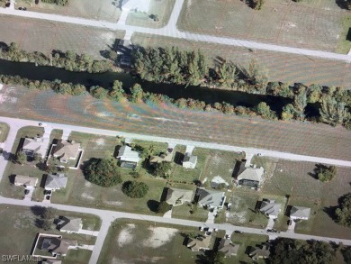 This double lot is perfect if you love living on the water in a on Del Tura Golf and Country Club in Florida - for sale on GolfHomes.com, golf home, golf lot