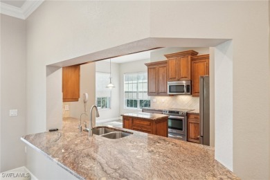 An Exceptional PRICE ENHANCEMENT! STUNNING carriage home in on Bonita Bay West in Florida - for sale on GolfHomes.com, golf home, golf lot