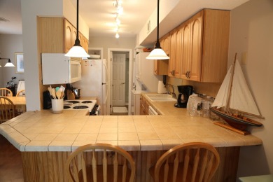 Desirable first floor, 1 BR, 1 BA Driftwood Villa overlooking on The Plantation Course At Edisto in South Carolina - for sale on GolfHomes.com, golf home, golf lot
