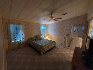 This lovely larger home has had a full roof replacement and All on Lakes at Leesburg Golf Course in Florida - for sale on GolfHomes.com, golf home, golf lot