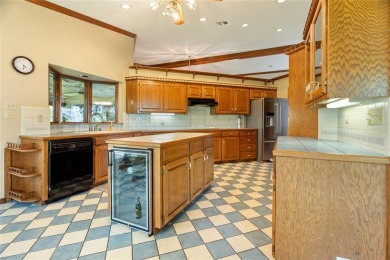 Spanish-style charm shines in this beautiful home set on an on Hillsboro Country Club in Texas - for sale on GolfHomes.com, golf home, golf lot